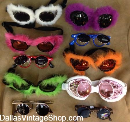 DFW's BEST Ubbi Dubbi Outfits: Furry Goggles, Bright Boas, Lumi Booty Shorts, Shiny or Glowing Leg Straps, Mesh & Bright Tops, Leg Warmers and more from Dallas Vintage Shop. Ubbi Dubbi Outfits, What to wear to Ubbi Dubbi and Ubbi Dubbi Costume Ideas from Dallas Vintage Shop.